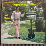 Webb Pierce signed record.