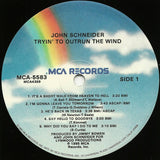 John Schneider : Tryin' To Outrun The Wind (LP, Album)