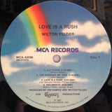 Wilton Felder : Love Is A Rush (LP, Album, Pin)